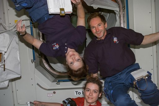 Tamara Jernigan, Valeri Tokarev and Julie Payette pose for photo in Node 1/Unity module