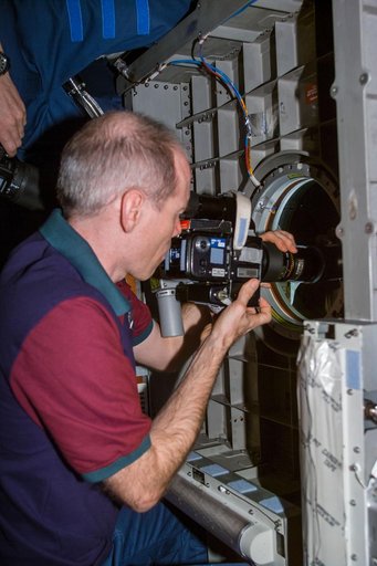 Daniel Barry in Spacehab module with camera