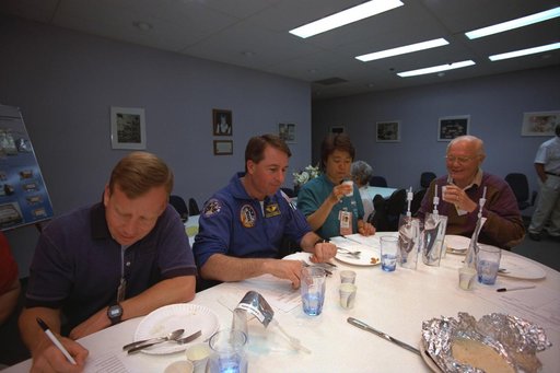 Various views of STS-95 Senator John Glenn during training