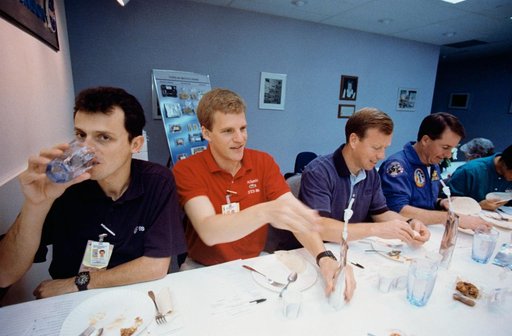 Various views of STS-95 Senator John Glenn during training