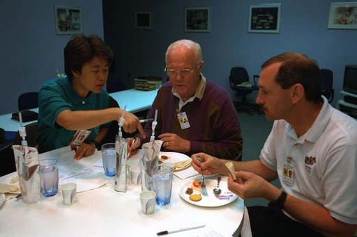 Various views of STS-95 Senator John Glenn during training