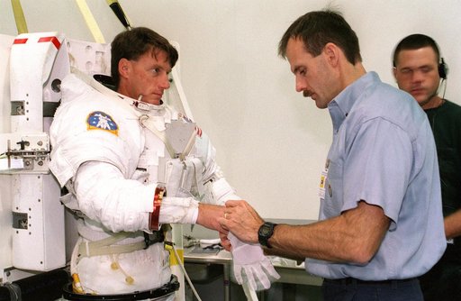STS-103 crewmembers at the NBL