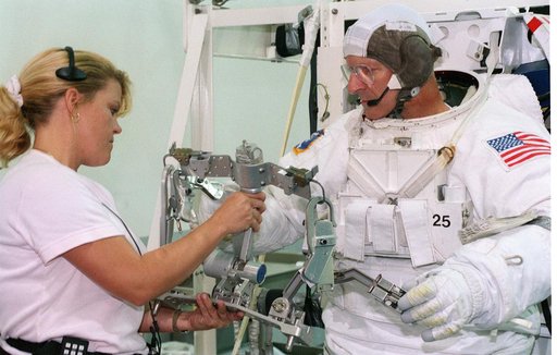 STS-103 crewmembers at the NBL