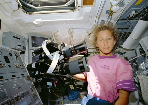 STS-46 Mission Specialist Ivins with HASSELBLAD cameras on OV-104 flight deck