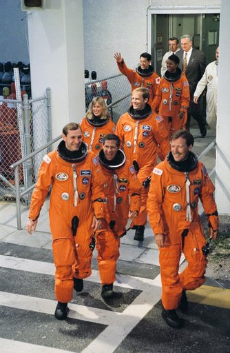 STS-47 crew leaves KSC's O&C Building on their way to Launch Complex 39