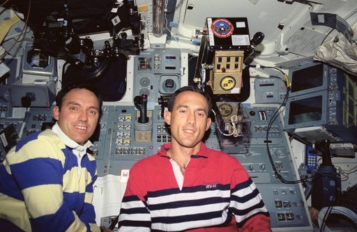 Astronauts Walz and Newman in STS-51 Discovery's aft flight deck