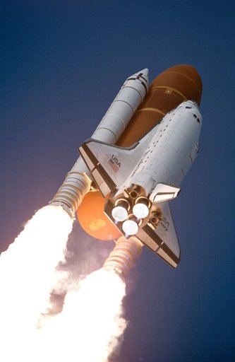 STS-53 Discovery, Orbiter Vehicle (OV) 103, rises into sky after KSC liftoff
