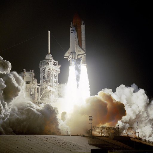 STS-56 Discovery, OV-103, lifts off from KSC LC Pad 39B into darkness