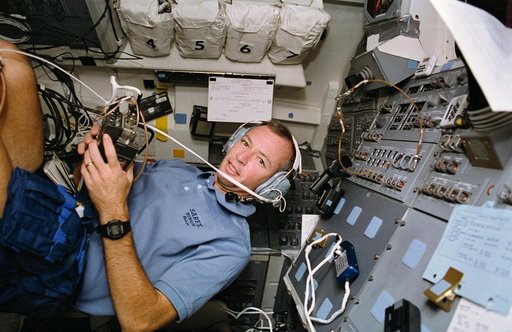STS-57 Pilot Brian J. Duffy uses SAREX II on the aft flight deck of OV-105
