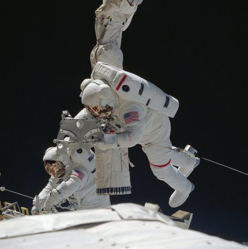 STS-57 astronauts Low and Wisoff perform DTO 1210 EVA in OV-105's payload bay