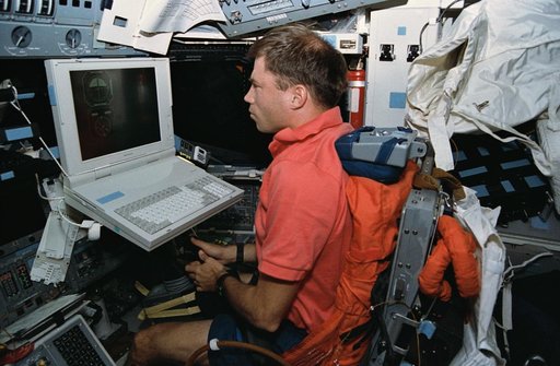 Pilot Searfoss in experiment measuring effects space flight & pilot ability