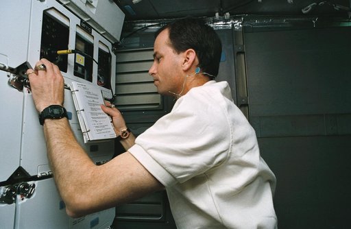 Astronaut Kevin Chilton works with advanced cell reactor