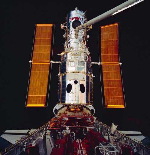 Hubble Space Telescoe being surveyed by cameras mounted on the RMS