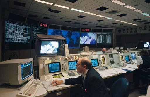 Mission control activity during STS-61 EVA-1