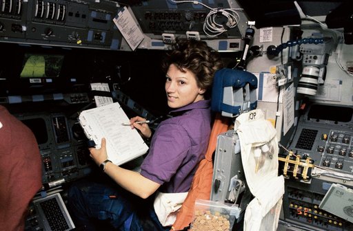 Astronaut Eileen Collins at pilots station during "hotfiring" procedure