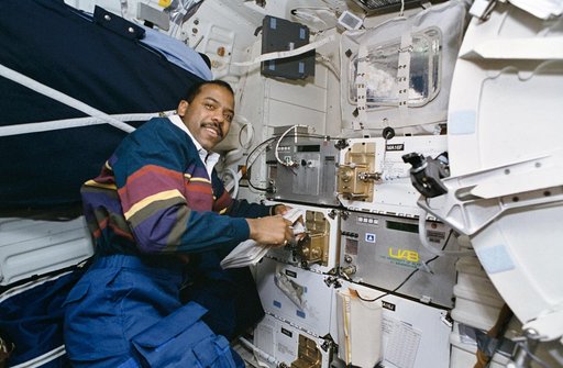 Astronaut Bernard Harris monitors Spacehab experiments