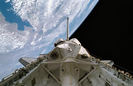STS-65 IML-2 spacelab module in Columbia's payload bay with Earth background