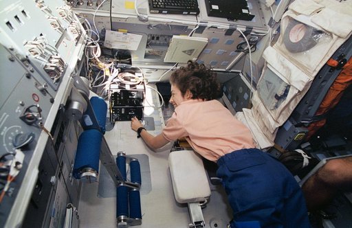Astronaut Ellen Ochoa works with ATMOS experiment checkout