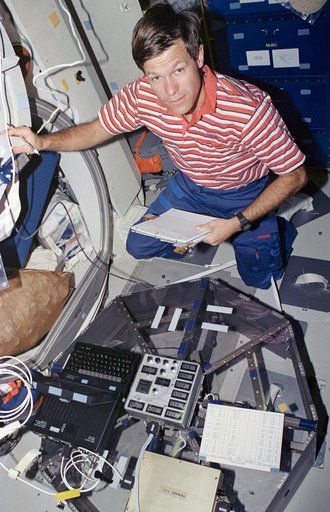 Astronaut Donald McMonagle works with HPP-2 experiment on middeck