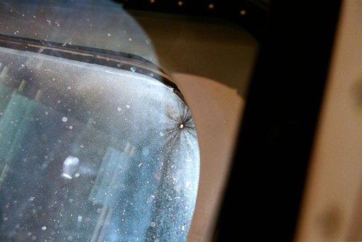 Documentation of debris impact damage to flight deck window