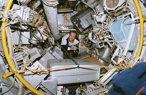 Astronaut Precourt floats into Mir space station