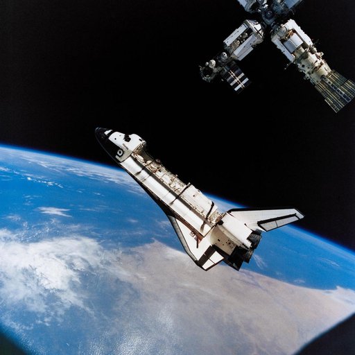 A view of Atlantis preparing to dock with the Mir Space Station on STS-71