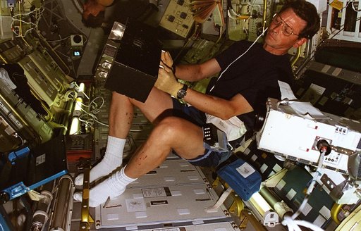 BDPU, Favier places new test chamber into experiment module in LMS-1 Spacelab