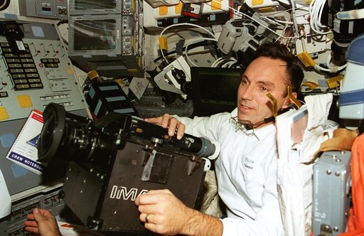 Astronaut Walz on flight deck with IMAX camera