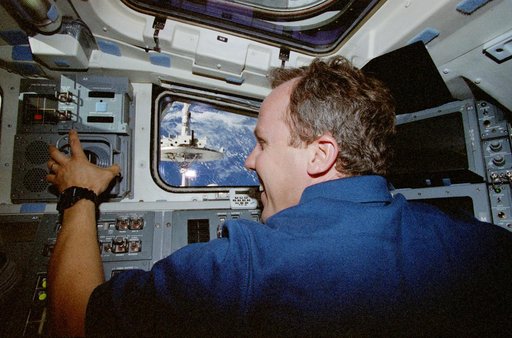 Posed views of Jones and Jernigan in the flight deck