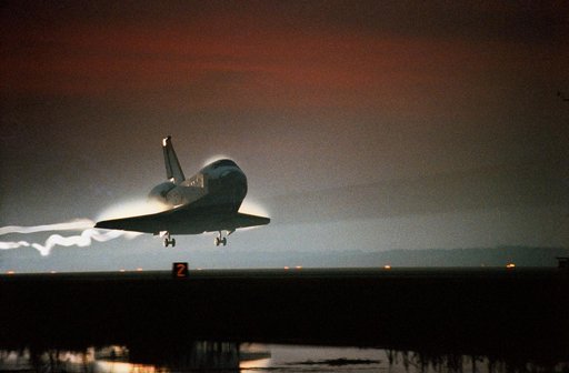 STS-80 Columbia, OV-102, lands at KSC's Shuttle Landing Facility