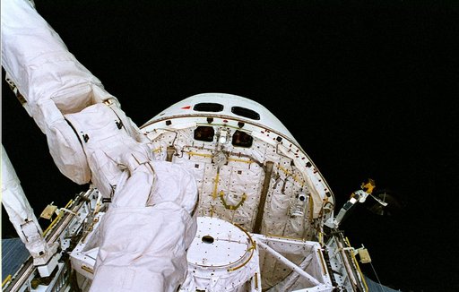 EVA 2 activity on Flight Day 5 - handheld camera views