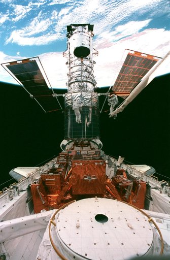 EVA 5 activity on Flight Day 8 to service the Hubble Space Telescope