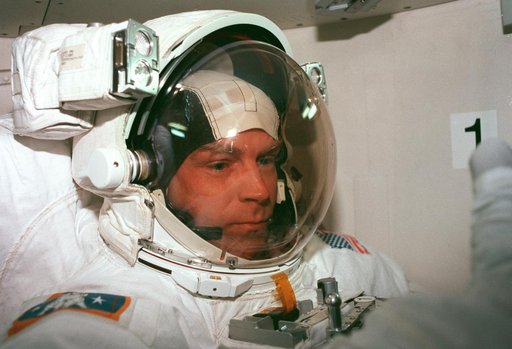 Middeck activity during EVA preparations and flight deck activity