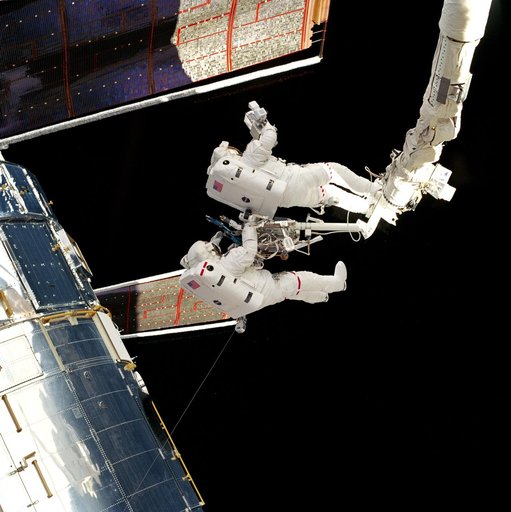 EVA 2 activity on Flight Day 5 to survey the HST solar array panels