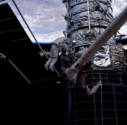 EVA 4 activity on Flight Day 7 to service the Hubble Space Telescope