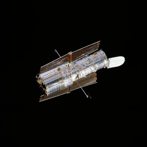 HST, flyaround of the telescope after deployment on this second servicing mission