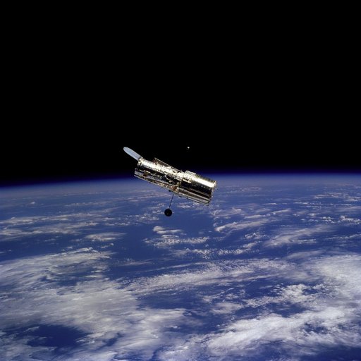 HST, flyaround of the telescope after deployment on this second servicing mission