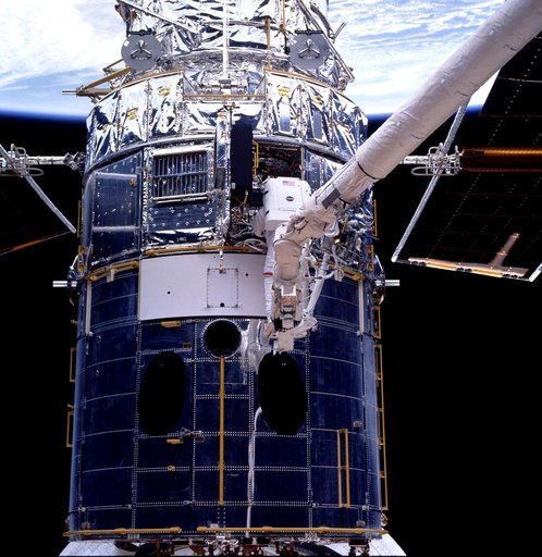EVA 3 activity on Flight Day 6 to service the Hubble Space Telescope