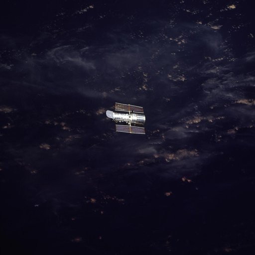 HST, flyaround of the telescope after deployment