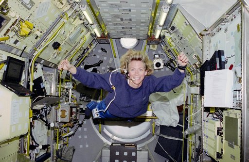 Candid views of Pilot Still in the Spacelab module