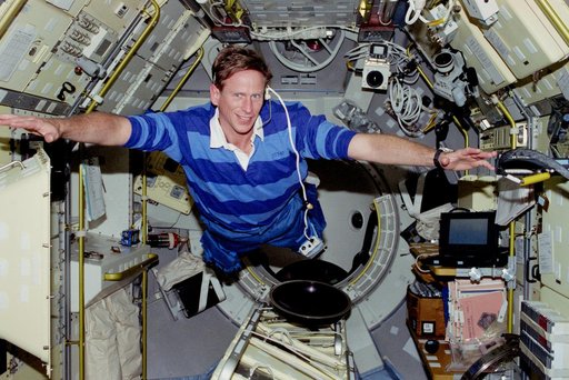 Candid views of Crouch and Gernhardt in the Spacelab module