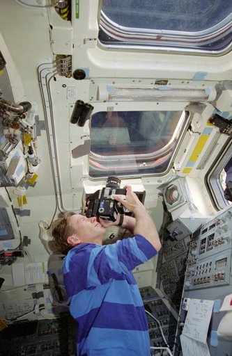 MS Gernhardt on aft flight deck with camera