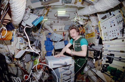 Lazutkin conducts transfer ops in the Mir Space Station Base Block