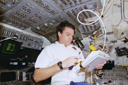 Scott and Kregel work in the flight deck