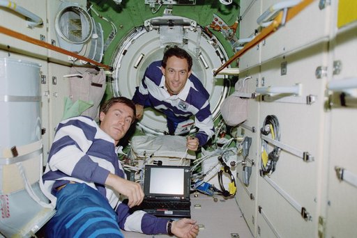 View of the STS-88 crew at work in the FGB/Zarya module