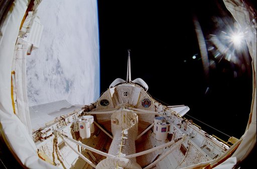 Fish-eye view of the STS-90 Columbia's payload bay with sunburst