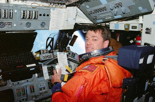 STS-93 Pilot Ashby seated at the flight deck pilot's station