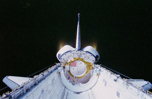 A view of the Columbia's OMS engine pods during a burn