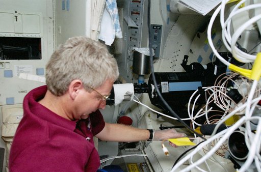 Mission Specialist Hawley works with the SWUIS experiment