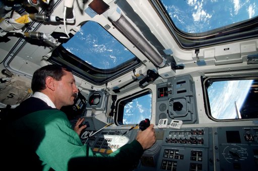 Brown at RMS controls on the aft flight deck